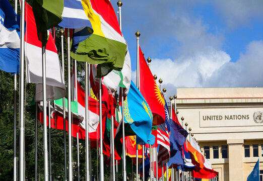 Geneva, Switzerland, Europe : Palace of Nations, national flags of the member states  in foreground, European Headquarters of United Nations, United Nations Office at Geneva (UNOG), Place des Nations
