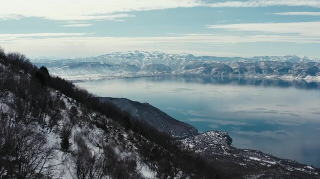 Aerial view of lake ohrid and snowy mountains in winter