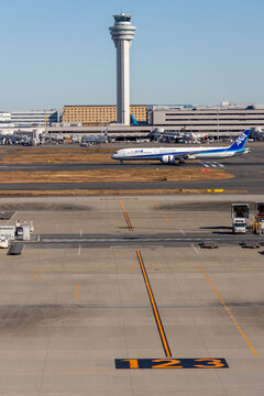 aANA airplane travels on the runway in Haneda Airport in Tokyo