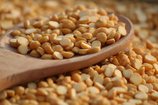 Toor dal is known as tur daal, yellow lentils split peas, indian split pigeon peas, arhar dal, tuvar dal, split peas, Yellow lentils, arahar daal, indian pulses. Concept of vegetarian protein food