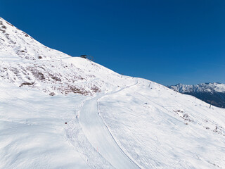 Obraz premium Winter time in the Austrian Alps, ski slopes, skiing, snowboarding