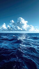 Ocean waves under a bright sky with cloud formation