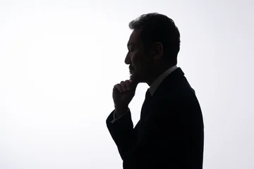 Fotobehang Onderzeeër 悩む男性　シルエット  © naka