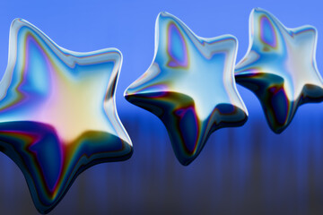 Obraz premium Shiny iridescent starshaped ornaments against a blue background. 3d rendering
