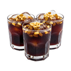 Three glasses of traditional Ramadan date drink with pine nuts