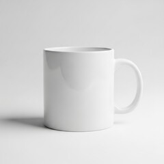 Fototapeta premium Plain White Ceramic Mug With A Handle Sitting On A White Surface With Subtle Shadows Isolated White Background