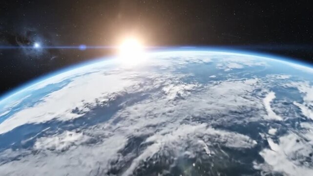 View of planet Earth from space shows the sunrise over the continents and the atmosphere, creating a beautiful