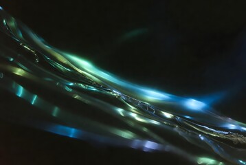 Closeup of glowing fiber optic strands in a dark background with cinematic neon light abstract photography
