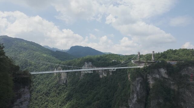 Side view of Glass Bridge over Grand Canyon in Zhangjiajie National Forest Park, China