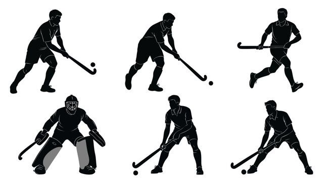 Field hockey players in action silhouettes