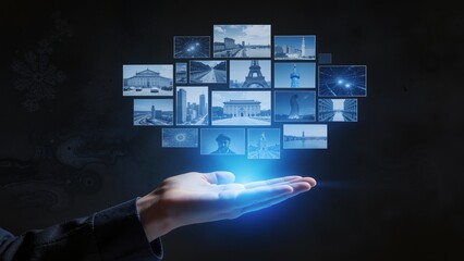 Hand holding digital cloud of images