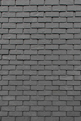 Obraz premium Black slate roof tiles texture with metal hooks pattern