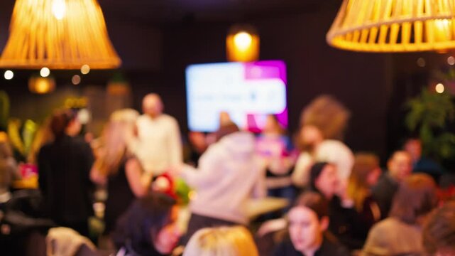 Fuzzy party scene. Friends toast near cake lighting. Celebration with soft lights and joyful moments