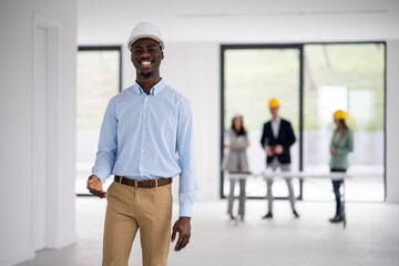 Fototapeta premium African american architect worker smiling on construction site