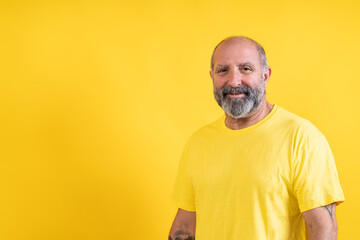 Mature man smiling looking at camera