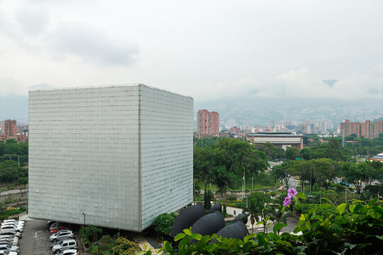 Medellin, Colombia, February 2026: Casa de la Musica modern cube building at sunset in Parque de los Deseos urban area
