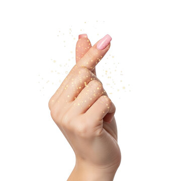 Female hand making a finger heart gesture with golden sparkles over a isolated on transparent background