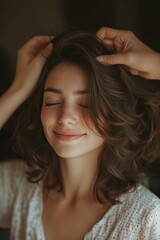 A woman with short hair is in a pleasant mood. She has brown hair and her eyes are shut.