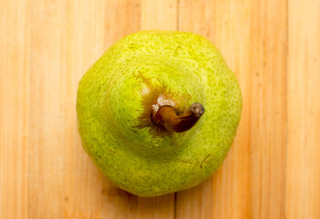 The vegetable Pear on a wooden background.