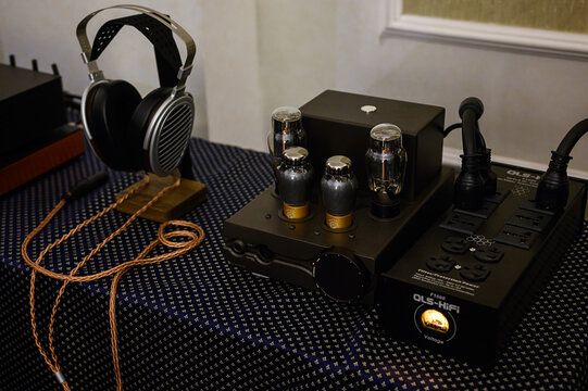 Moscow, Russia - October 20, 2024: HIFIMAN HE1000 V2 Planar Magnetic Headphones, QLS-HiFi F1000 F-1000 Surge Protector, Feliks Audio Euforia Evo Stationary Headphone Amplifier