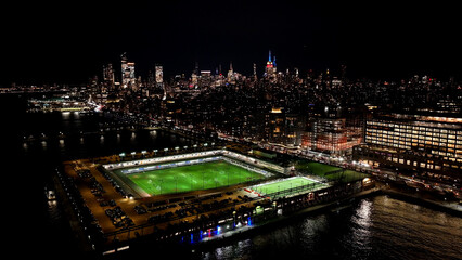 Obraz premium Night New York Skyline In Manhattan New York United States. Capturing The Hustle And Bustle Of A Vibrant City From Above. Building Town Sky Illuminated Urban. Illuminated Landmark. Manhattan New York.