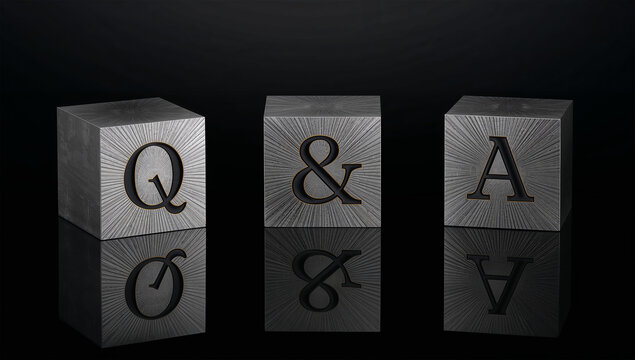 金属のキューブを黒い鏡面に置いてQ&Aをきりっと見せる