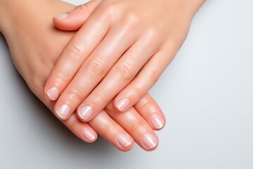 Naklejka premium Close-Up of Smooth Hands Displaying Skin Beauty with Natural Nail Care