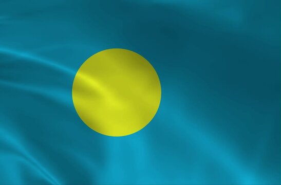National Flag of Palau Waving in Wind Loop &ndash; Republic of Belau Symbol with Sky Blue and Golden Yellow Moon Colors