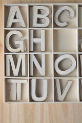 shallow wood box with wood letters