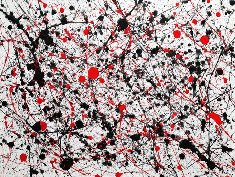 Energetic splatter painting with black and red paint on a white canvas
