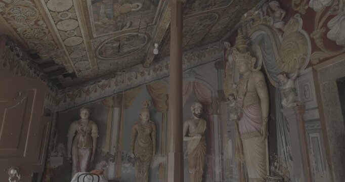 Colorful Sculptures in Intricate Ancient Temple Room