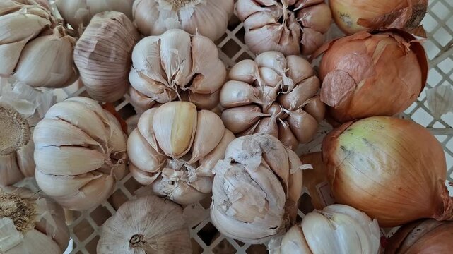 garlic and onions  in a basket