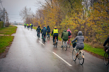 Obraz premium Group of cyclists on city road, street, asphalt