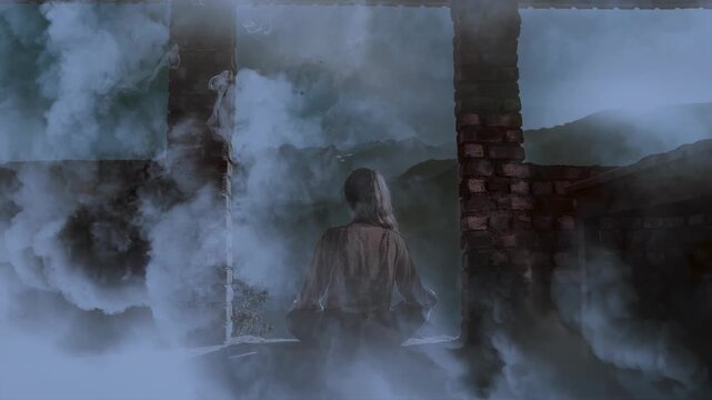 Meditation in the mountains An Inner Journey for Achieving Clarity and Calmness Within Yourself. Woman with her back turned surrounded by magical smoke. loop movie.
