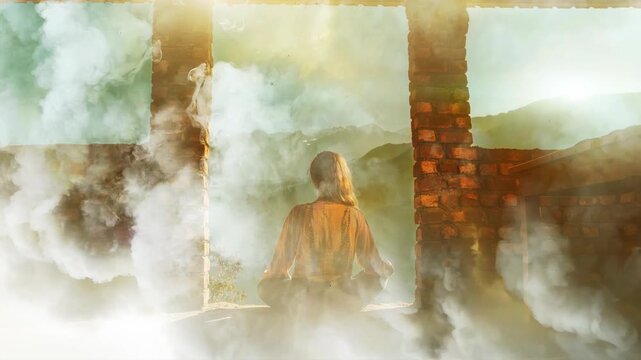 Meditation in the mountains An Inner Journey for Achieving Clarity and Calmness Within Yourself. Woman with her back turned surrounded by magical smoke. loop movie.