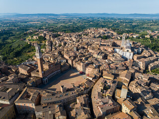 Naklejka premium Aerial view of Siena, Piazza del Campo (Campo square), Palazzo Publico and Torre del Mangia (Mangia tower), Tuscany, Italy
