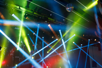 Abstract background of green and blue dynamic light in night club