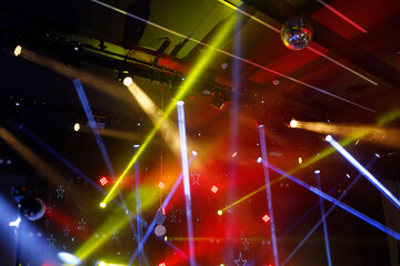Abstract background of colorful dynamic light in night club