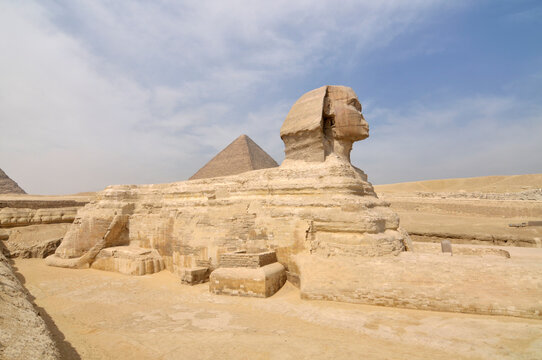 The pyramid of Khafre or of Chephren with a statue of a sphinx in the foreground