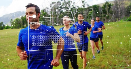 Leading male runner in bright blue shirt and dark shorts running across grassy meadow, HUD overlay