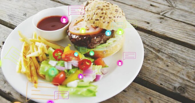 Camera pulling back, chat icons floating then settling over white plate with burger, showing buzz