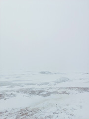 A frozen sea with snow