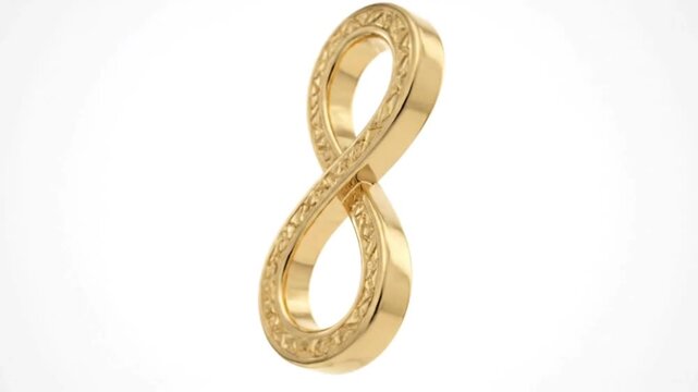 Two gold wedding rings intertwined together symbolizing eternal love.