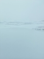 A frozen sea with snow