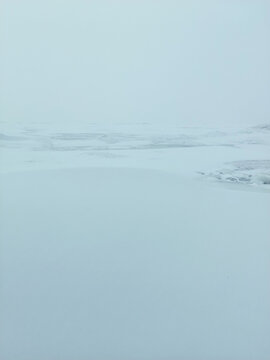 A frozen sea with snow