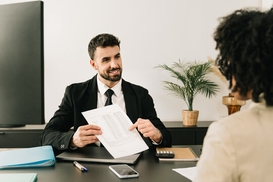 Business man explaining financial report between professionals after successful investment meeting at the office