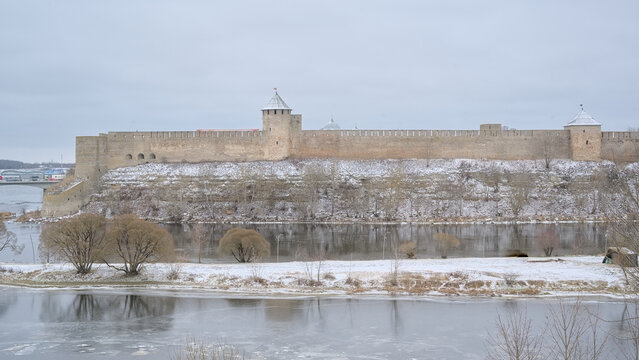 Ivangorod Fortress alongfrozen Narva river. Oblast, Russia