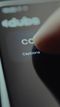 Finger taps the option to enable Closed Captions within an application