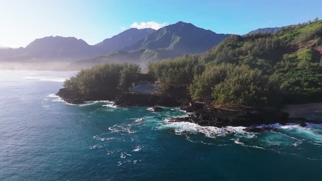 Rocky coast with waves blue water in Hawaii, drone video, Kauai 4K