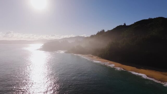 Natural beach in Hawaii with gorgeous lush hills, drone video, Kauai 4K